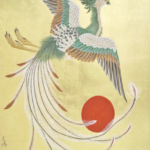 A Japanese painting of a phoenix with yellow background and the white phoenix is rising above the red sun. The phoenix is white with some green and yellow on its feathers.