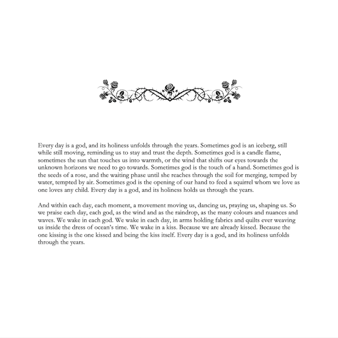 Page from a book showing a poem with vintage roses graphic in black and white.